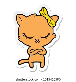sticker of a cute cartoon cat with bow