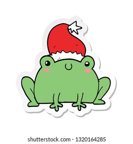 sticker of a cute cartoon christmas frog