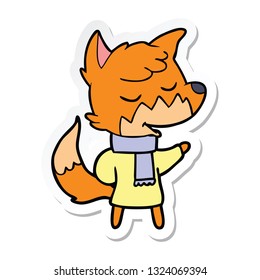 sticker of a friendly cartoon fox in winter clothes