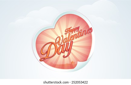 Sticker or label in heart shape for Happy Valentine's Day celebration on shiny cloudy sky blue background.