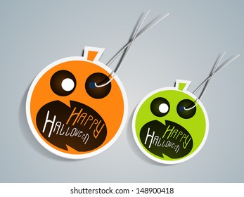 Sticker, label or tag for Halloween Party with scary pumpkins on abstract grey background.