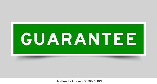 Sticker label with word guarantee in green color on gray background