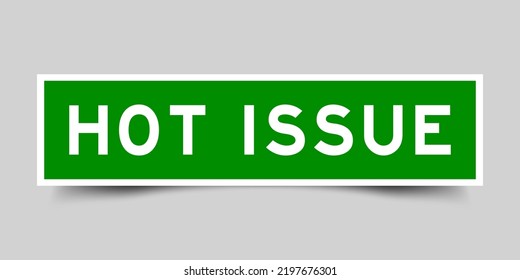 Sticker label with word hot issue in green color on gray background