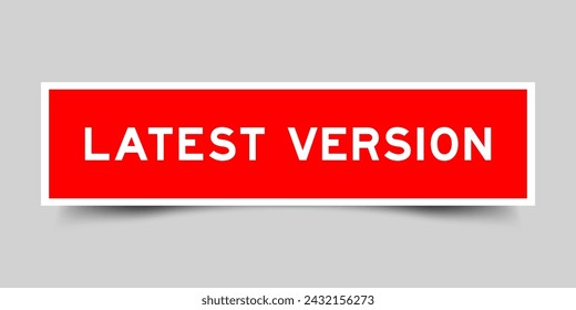 Sticker label with word latest version in red color on gray background