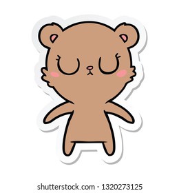 sticker of a peaceful cartoon bear cub