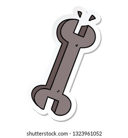 sticker of a quirky hand drawn cartoon spanner