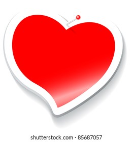 sticker in the shape of a red heart with a white border