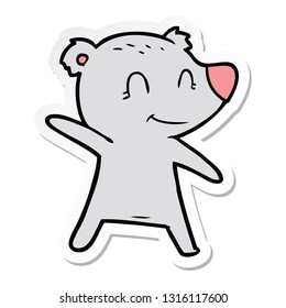 sticker of a smiling bear pointing