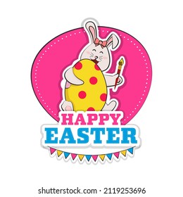 Sticker Style Happy Easter Font With Cartoon Bunny Holding Colored Egg And Paint Brush On Pink And White Background.