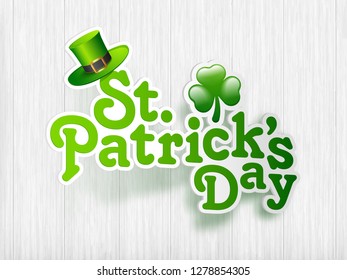 Sticker style text of St. Patrick's Day with clove leaf and leprechaun hat illustration on wooden texture background.