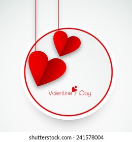 Sticker, tag or label with red hanging love hearts for Happy Valentine's Day celebration.