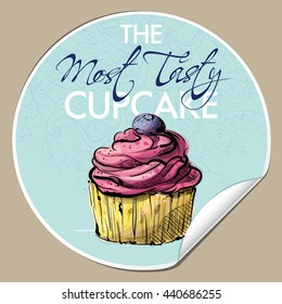 Sticker with tasty cupcake (sketch style). Vector illustration.