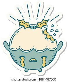 sticker of a tattoo style christmas pudding character crying