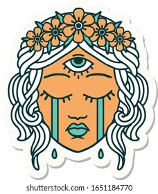 sticker of tattoo in traditional style of female face with mystic third eye crying