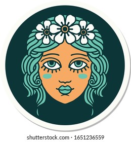 sticker of tattoo in traditional style of female face with crown of flowers