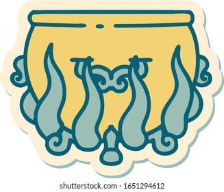 sticker of tattoo in traditional style of a lit cauldron