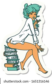 sticker of tattoo in traditional style of a pinup girl sitting on books