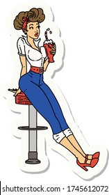 sticker of tattoo in traditional style of a pinup girl drinking a milkshake