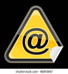 Sticker yellow hazard warning sign with commercial at symbol and curved corner on black background