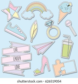 Stickers and patches collection. Trendy fashionable pins, labels in soft pastel colors. Design elements for girls, females. Rainbow, shoes, lollipop and other symbols