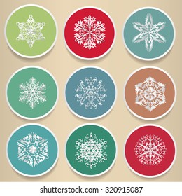 Stickers with snowflake on biege background
