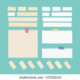 Sticky, adhesive masking tape, ruled ripped note paper stuck on blue squared background