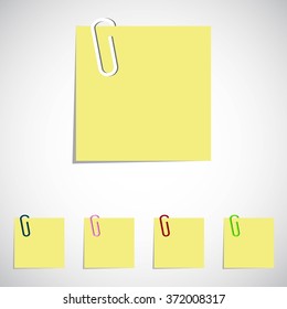 Sticky paper with clip on gray background. Vector art.