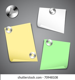 Sticky papers isolated on dark background with pushpins