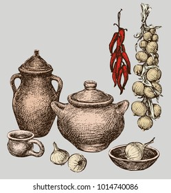 Still life with  the clay ware, onion and pepper. All objects isolated.