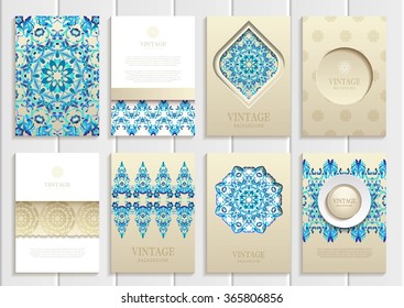 Stock set of brochures in vintage style. Vector design templates blue frames, ornaments, patterns and golden backgrounds. Use for printed materials, signs, elements, web sites, cards