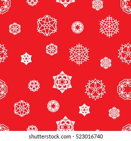 Stock snowflake vector seamless pattern on a red background