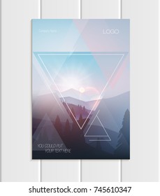 Stock vector brochure A4 or A5 format design business template with abstract triangles and mountain landscape at sunset, dawn backgrounds for printed material, element web site, card, cover, wallpaper