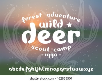 Stock vector handwritten font lowercase. Graphic design for t-shirt. White print on blurred background