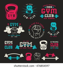 Stock vector illustration of gym club emblem and design elements. Color print on black background