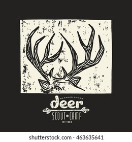 Stock vector linocut with a image of deer horns. Graphic design for t-shirt. White print on black background