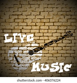 Stock Vector Live Music graffiti painted acoustic guitar on a brick background. There is room to place text or an image.