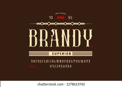 Stock vector serif narrow decorative font, alphabet, typeface. Brandy label template. Letters and numbers for alcohol logo and label design. Color print on brown background