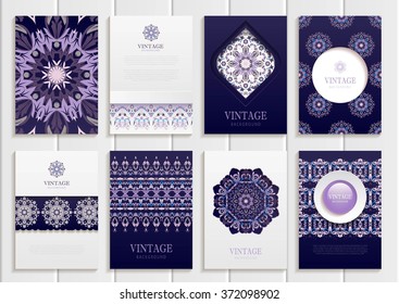 Stock vector set of brochures in vintage style. Design templates dark purple floral frames, ornaments, patterns and white backgrounds. Use for printed materials, signs, elements, web sites, cards