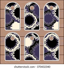 stock vector set of label with floral pattern on the wood background. template