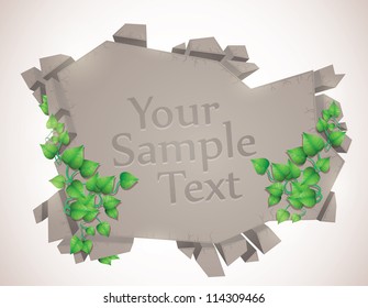 stone speech bubble with green leaves