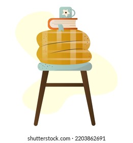 a stool with a plaid blanket, a book and a cup of tea. cozy autumn illustration