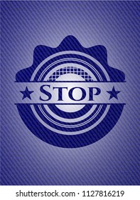 Stop badge with jean texture