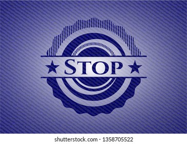 Stop badge with jean texture