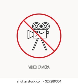 Stop or ban sign. Video camera with reel icon. Retro cinema sign. Prohibition red symbol. Vector