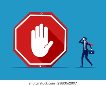 Stop deciding. Businessman makes decision with stop sign