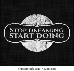 Stop dreaming start doing on chalkboard