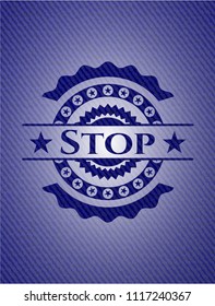 Stop emblem with jean background
