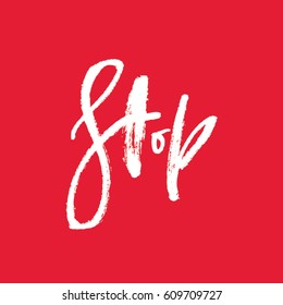 Stop - grungy brush calligraphy quote. Modern ink vector lettering illustration. White phrase isolated on red background.