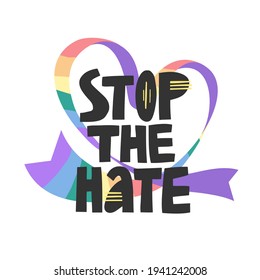 Stop the hate lettering on a rainbow colored heart-shaped ribbon