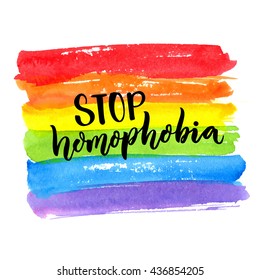 Stop homophobia. Gay pride slogan. Handwritten text on rainbow watercolor texture. Vector design